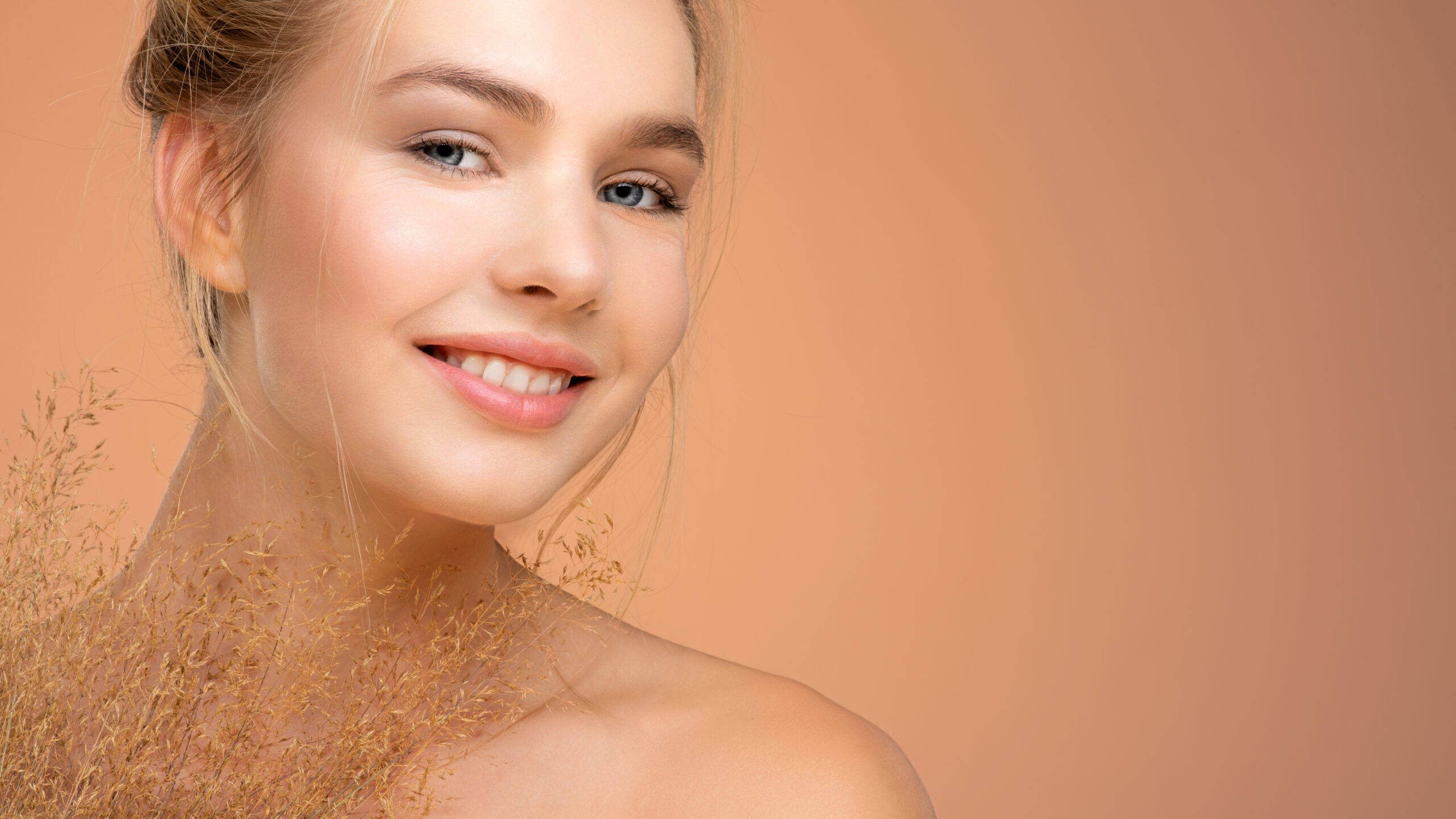 Portrait of young smiling woman with a healthy skin of a face. Med Spa in Brandon, FL<br />